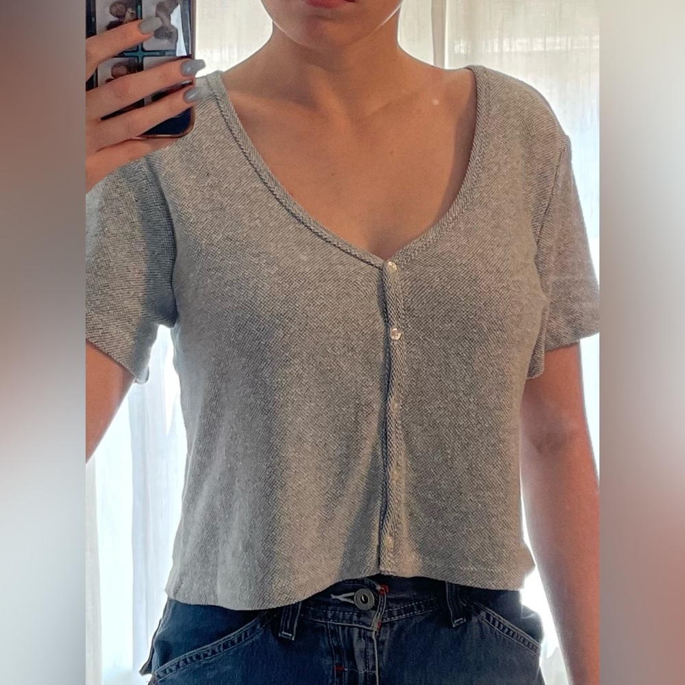 Light blue Cooper Key crop top.